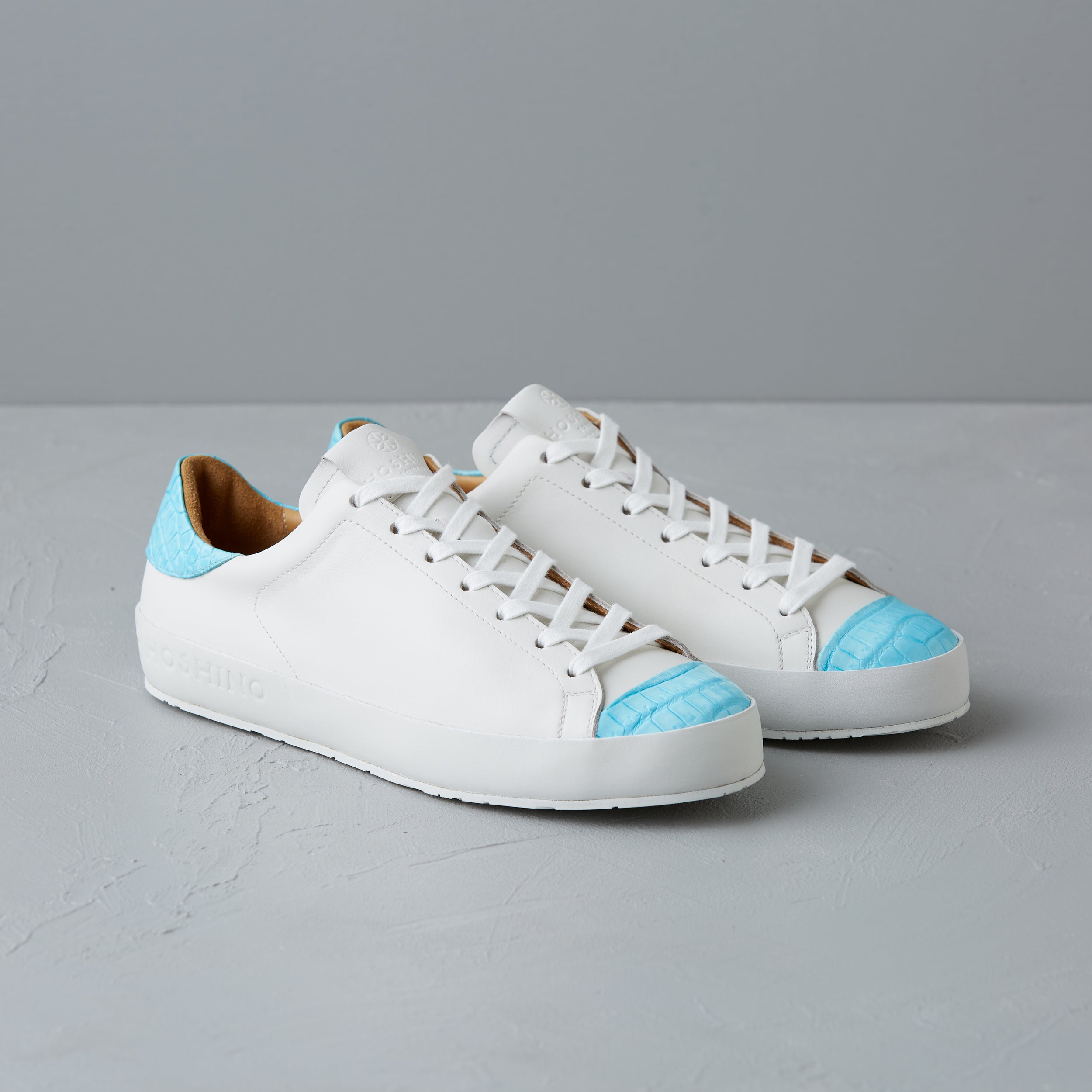 [women's] Liberte - low-top sneakers - combination toe white and blue crocodile